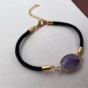 Handmade bracelet with a amethyst centre